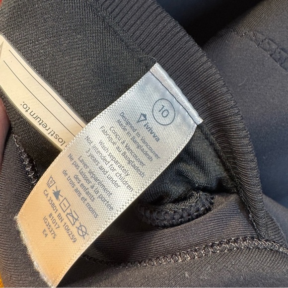 ivivva Black funnel neck short sleeve scuba top hidden drawstring pockets, sz 10 - Picture 8 of 11